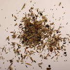 Small pile of Tall Prairie seeds on light background
