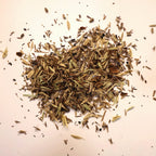 Small pile of native seeds for a raingarden on a light background